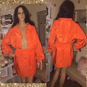 2 piece jacket and skirt outfit.